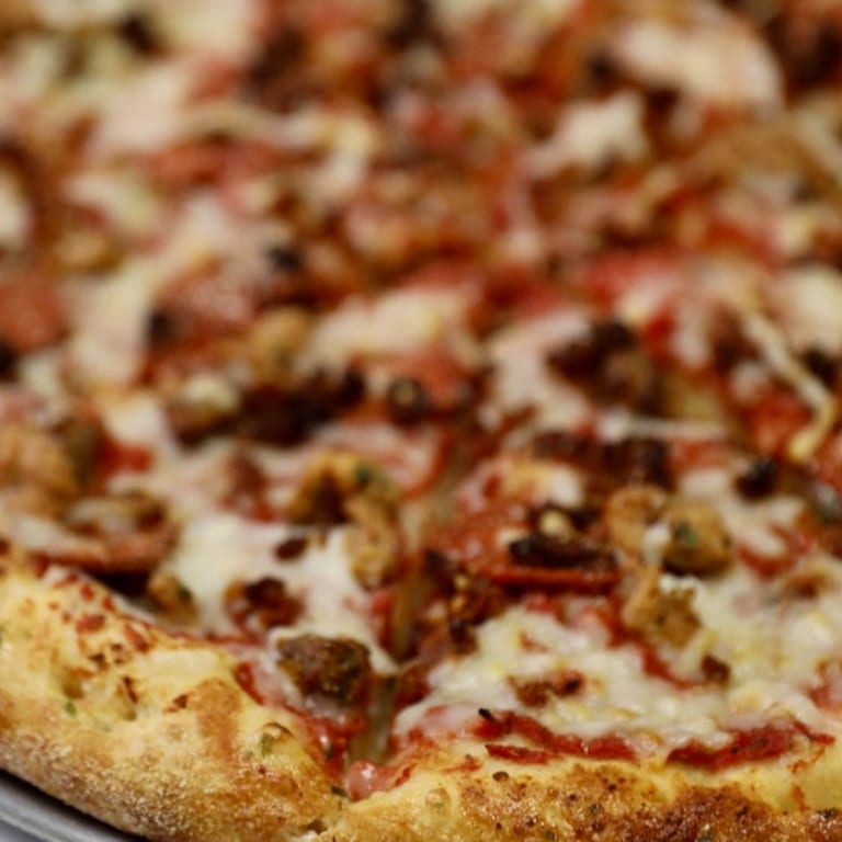 Indulge in Our Meat Pizza
