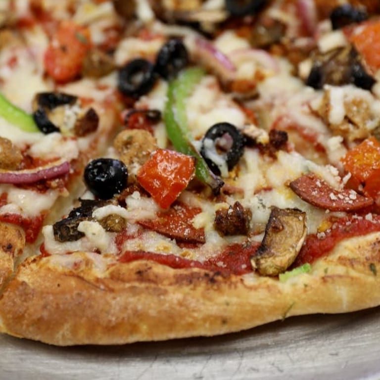 Supreme Pizza: Italian Delight with Veggie Variety