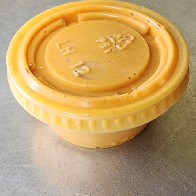 2 Oz Nacho Dip Sauce.